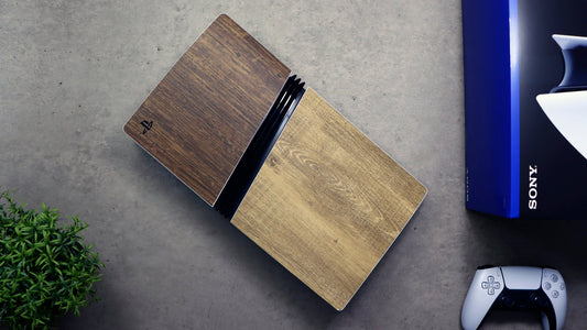 PS5 Pro with contrasting wood-effect vinyl skins on its outer panels
