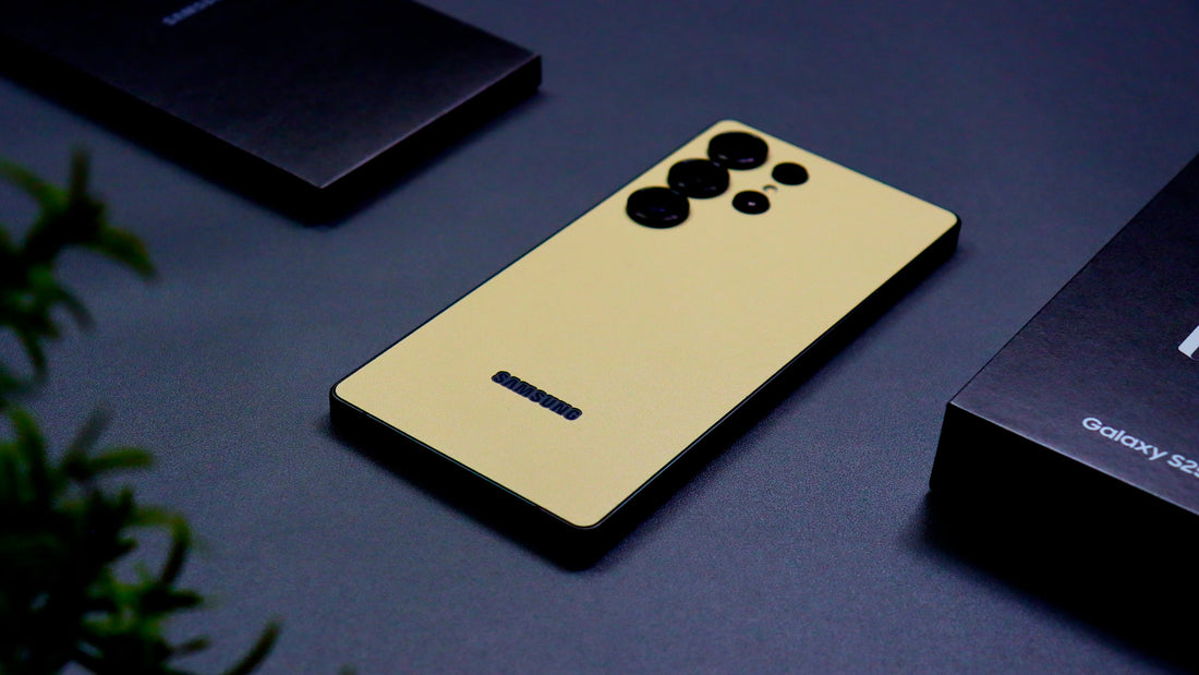 Samsung Galaxy S25 Ultra with a Textured Matt Cream skin, photographed on a desk